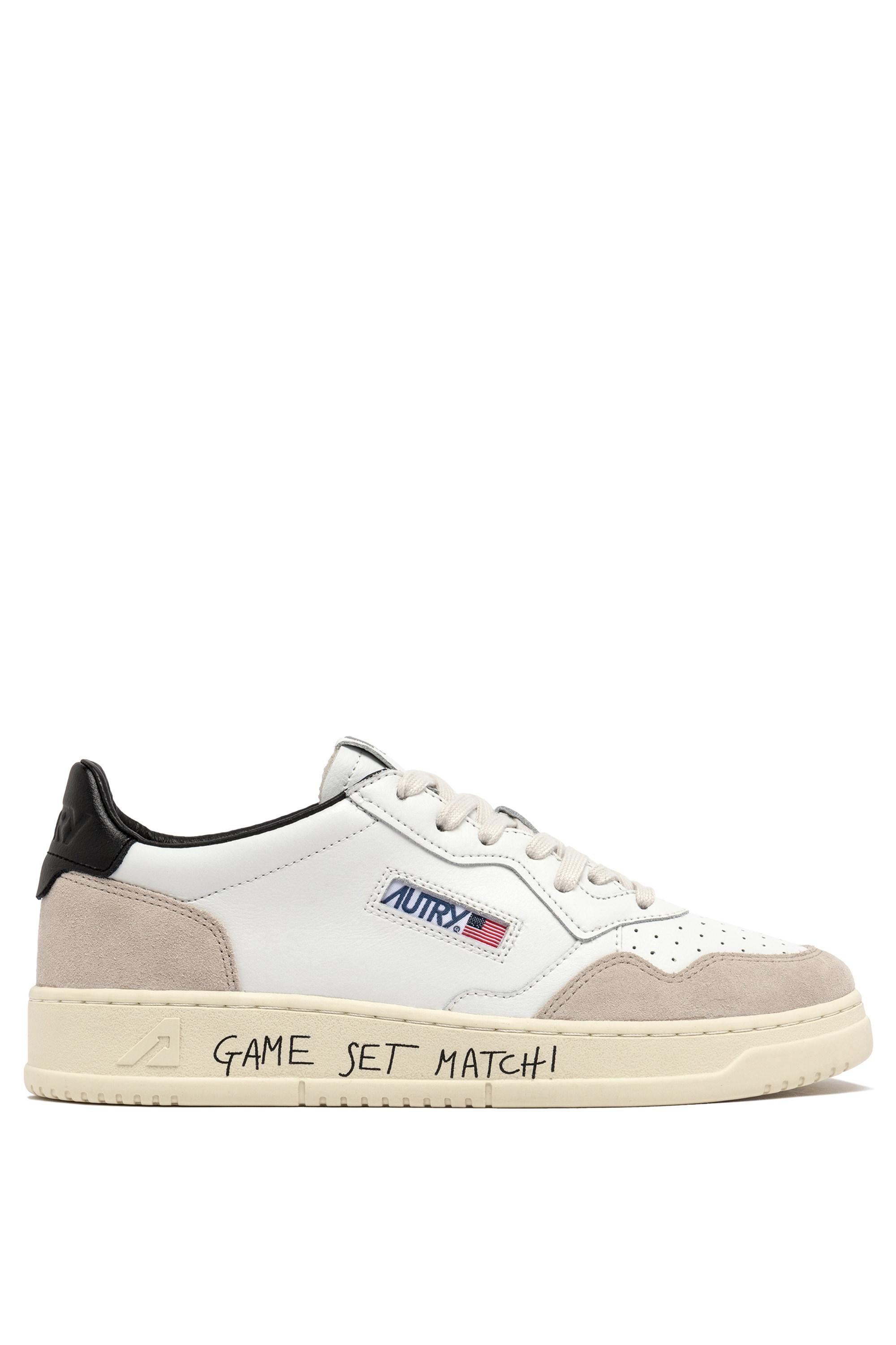 Sneakers pelle et daim avec inscription game set match